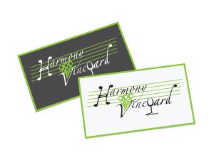 Harmony Vineyard logo displayed on business cards, 2 colour variations on 2 separate business cards