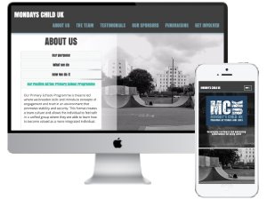 Monday's Child Website load page displayed on iMac screen and iphone screen